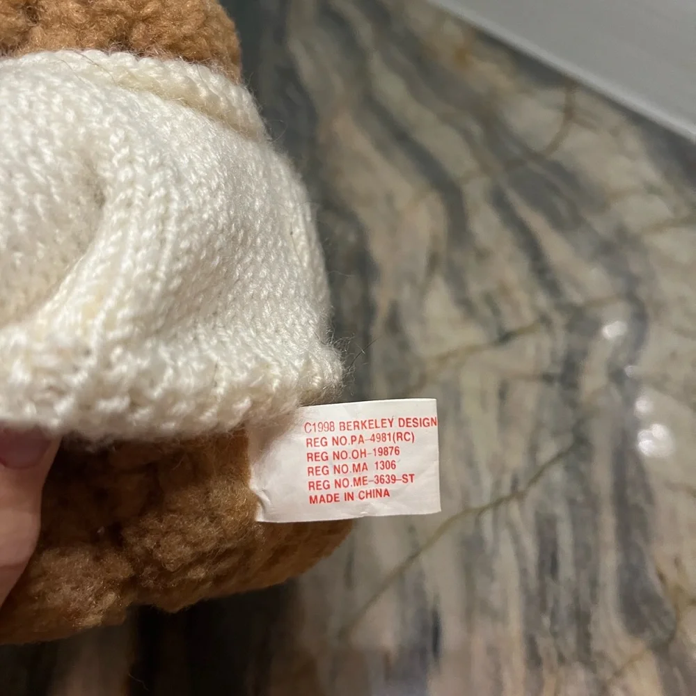 Berkeley Teddy Bear in sweater with rainbow squares